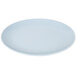 A white oval melamine platter with a blue rim.