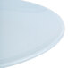 A close-up of a blue oval Thunder Group melamine platter with a round edge.