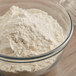 A bowl of Organic Whole Wheat Flour with a whisk.