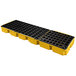 A yellow and black plastic pallet with squares.