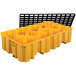 A yellow plastic Eagle Manufacturing drum pallet with a black grate.
