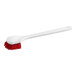 A red and white Lavex floating utility/pot scrub brush with a white handle.