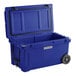 A navy blue CaterGator outdoor cooler with wheels.
