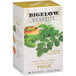 A box of Bigelow Benefits Moringa and Black Tea Bags with leaves on it.