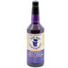 A bottle of Top Hat Provisions Blue Butterfly Pea Flower Concentrate with a label on it.
