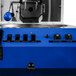 A blue Primo RAVEN-Xr15 coffee roaster with black text and buttons.