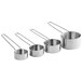 A group of American Metalcraft stainless steel measuring cups with wire handles.