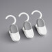 A white and grey OXO Good Grips Clip Hanger set with three hooks.