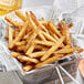 A basket of French fries with Regal Ultimate French Fry Seasoning.