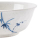 A white round melamine bowl with a blue and white bamboo design.