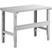 A white rectangular workbench with metal legs and a steel top.