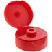 A red plastic Inverted squeeze bottle lid with a pressure sensitive liner.
