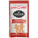 A Land O Lakes Cocoa Classics Gingerbread Cookie cocoa mix packet with a gingerbread man on the label.