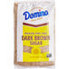 A white bag of Domino Dark Brown Sugar.