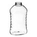 A clear ribbed PET honey bottle with a white lid.