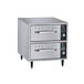 A Hatco freestanding narrow drawer warmer with two drawers.