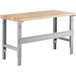 A Lavex heavy-duty workbench with a square edge maple top and metal legs.