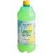 A green bottle of Natural Strength Lemon Juice Splash with a green lid.