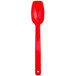 A red plastic Carlisle salad bar spoon.