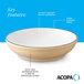 A tan matte stoneware pasta bowl with a glossy white interior and a dark banded edge.