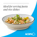 A cream white matte stoneware pasta bowl filled with a pasta dish, ideal for serving pasta and rice dishes.