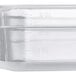 A close up of a translucent polypropylene food pan with white text.