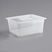 A translucent polypropylene plastic container with a lid on a white surface.
