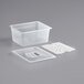 A white plastic food pan with a lid and a square hole.