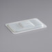 A white translucent Vigor polypropylene container lid with handles.