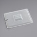 A translucent polypropylene plastic container lid with a notch.