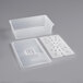 A white rectangular Vigor translucent plastic food pan with a handled lid and white tray with a square hole.