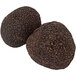 Two brown round objects, Urbani Fresh Black Winter Truffles.