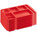 A stack of red Choice heavy-duty melamine 7 compartment trays.