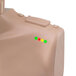 A close up of a Prestan adult CPR manikin with green, red, and yellow dots.