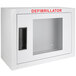 A white metal cabinet with a glass door for a Compact Surface Mount AED.