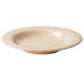 A beige rimmed melamine bowl with a speckled white surface.