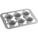 A silver Chicago Metallic 6 cup popover pan with holes in the cups.