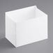 A white Choice take-out box with a fast top lid on a gray surface.