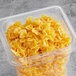 A plastic container with Barilla Protein+ Farfalle Pasta in it.