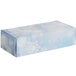A blue rectangular candy box with snowflakes on it.