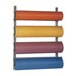 A Bulman wall rack with four paper rolls on it.