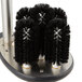 A circular brush holder with black bristles for Galaxy glass washers.
