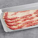 Sliced Godshall's smoked beef bacon on a gray tray.