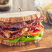 A sandwich with Godshall's beef bacon and lettuce.