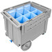 A grey plastic container with blue bins inside.