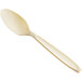 A close-up of a Solo Impress Heavy Weight Champagne plastic spoon.