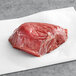 A piece of TenderBison raw bison tenderloin steak on a white paper.