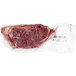 A piece of TenderBison bone-in bison New York strip steak in a plastic bag.