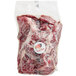A white bag of raw TenderBison hanging tender meat.