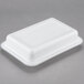 A white Pactiv Newspring rectangular plastic container with a lid.